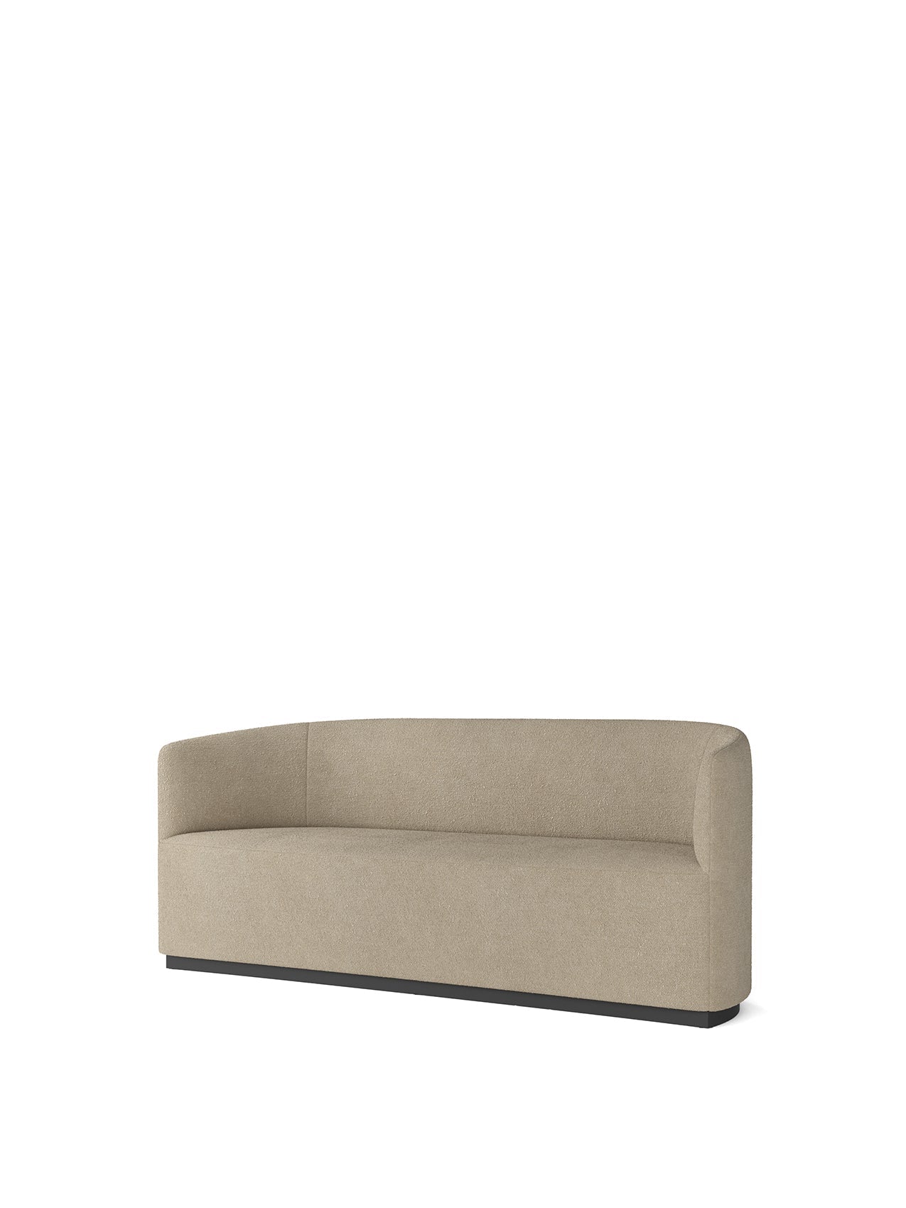 The Tearoom Sofa in light Audo Bouclé 02 fabric, featuring a curved back and dark recessed base, shown at an angle.