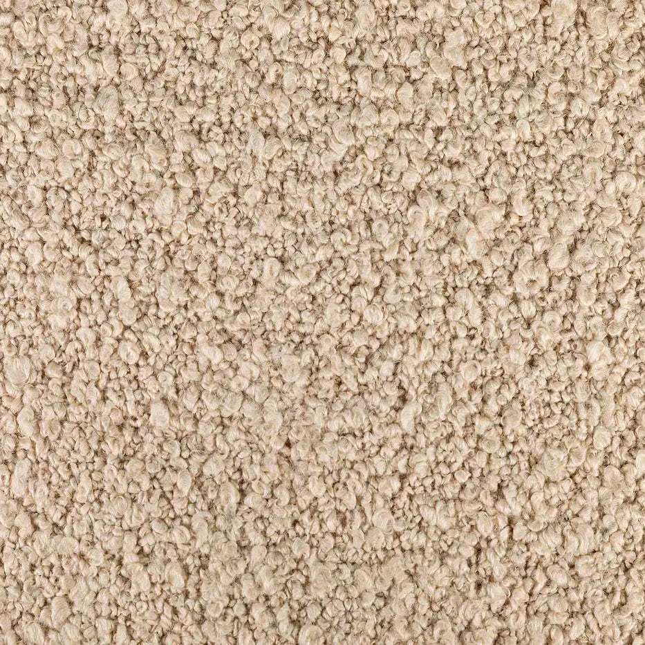 A close-up, detailed image of a cream-coloured bouclé fabric, showcasing its distinctive looped and nubby texture.