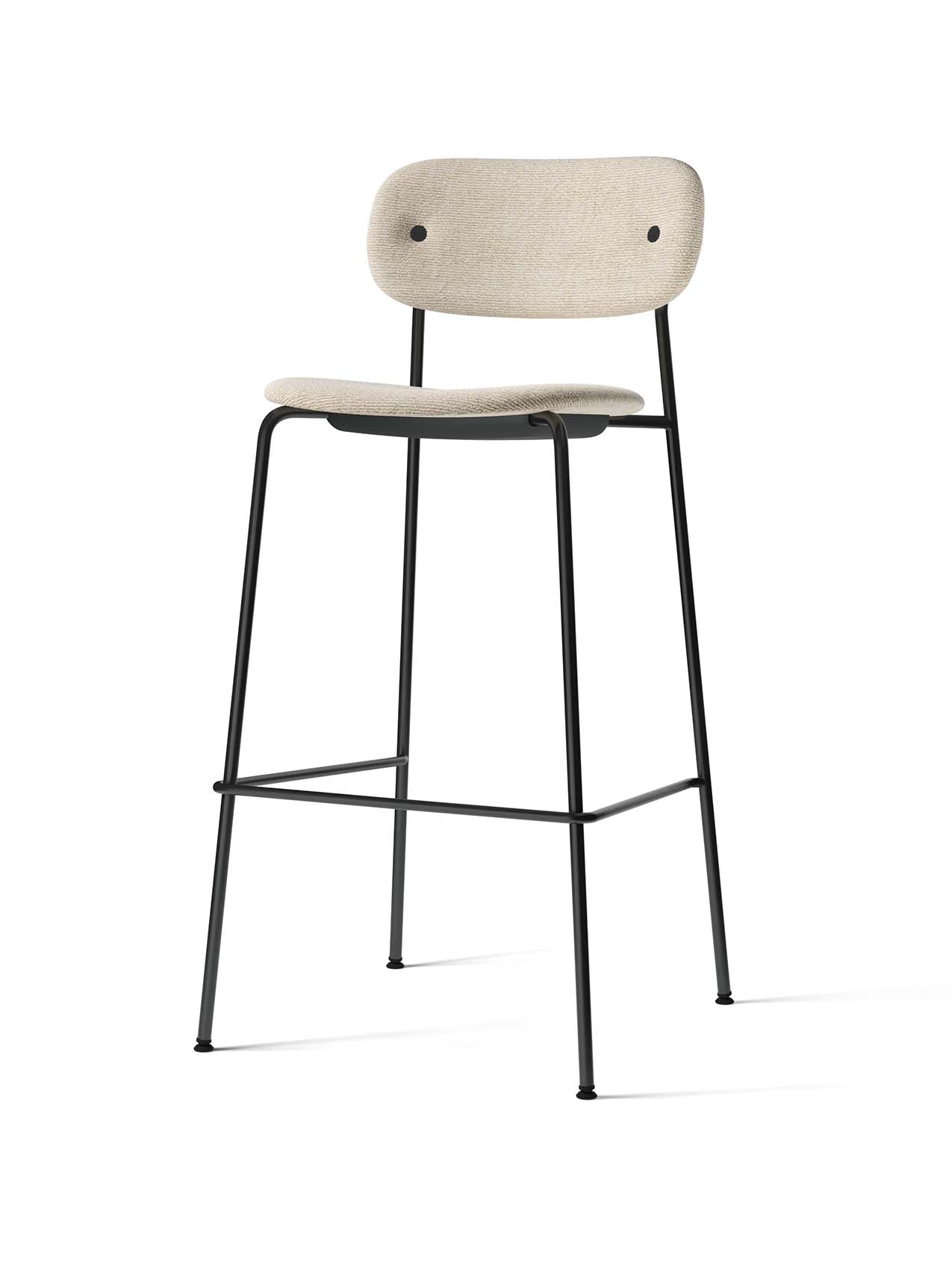 The Co Bar Chair, Fully Upholstered, has a light-coloured textured fabric seat and backrest, on a slender black steel frame.
