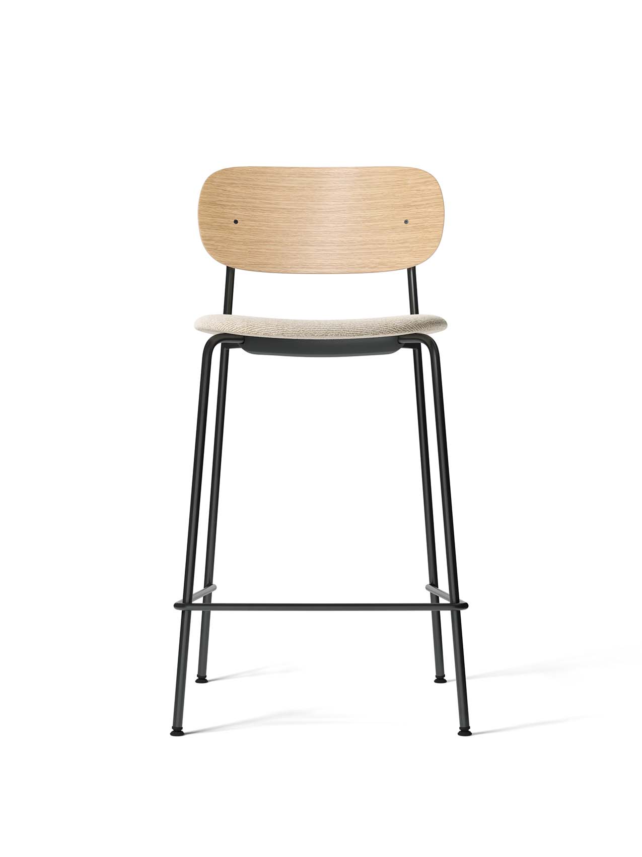Co Counter Chair, Seat Upholstered, with natural oak backrest, light-coloured upholstered seat, and black steel frame.