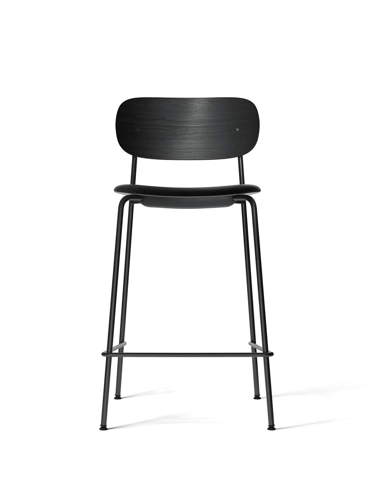 The Co Counter Chair in black oak with a black leather upholstered seat and a black steel frame, viewed from the front.