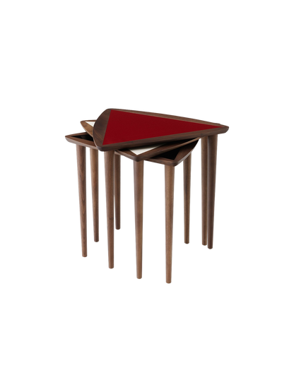 A set of three Umanoff Nesting Side Tables with walnut frames, stacked together. The top table has a triangular burgundy top.
