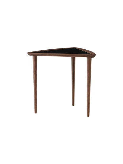 The Umanoff Nesting Side Table in walnut with a black triangular laminate top, viewed from an angle on a plain background.