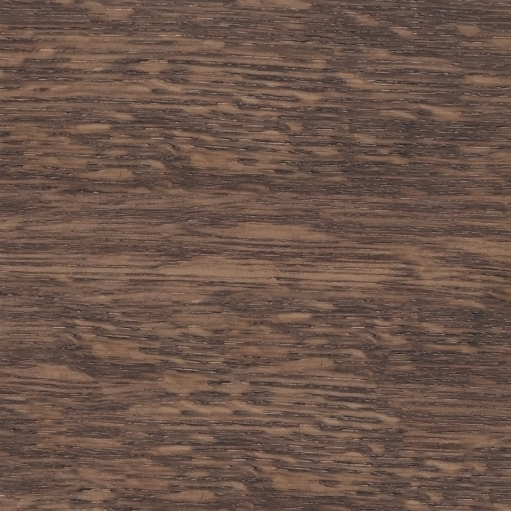A close-up image showing the texture of a dark brown wood surface with a distinct horizontal grain pattern.
