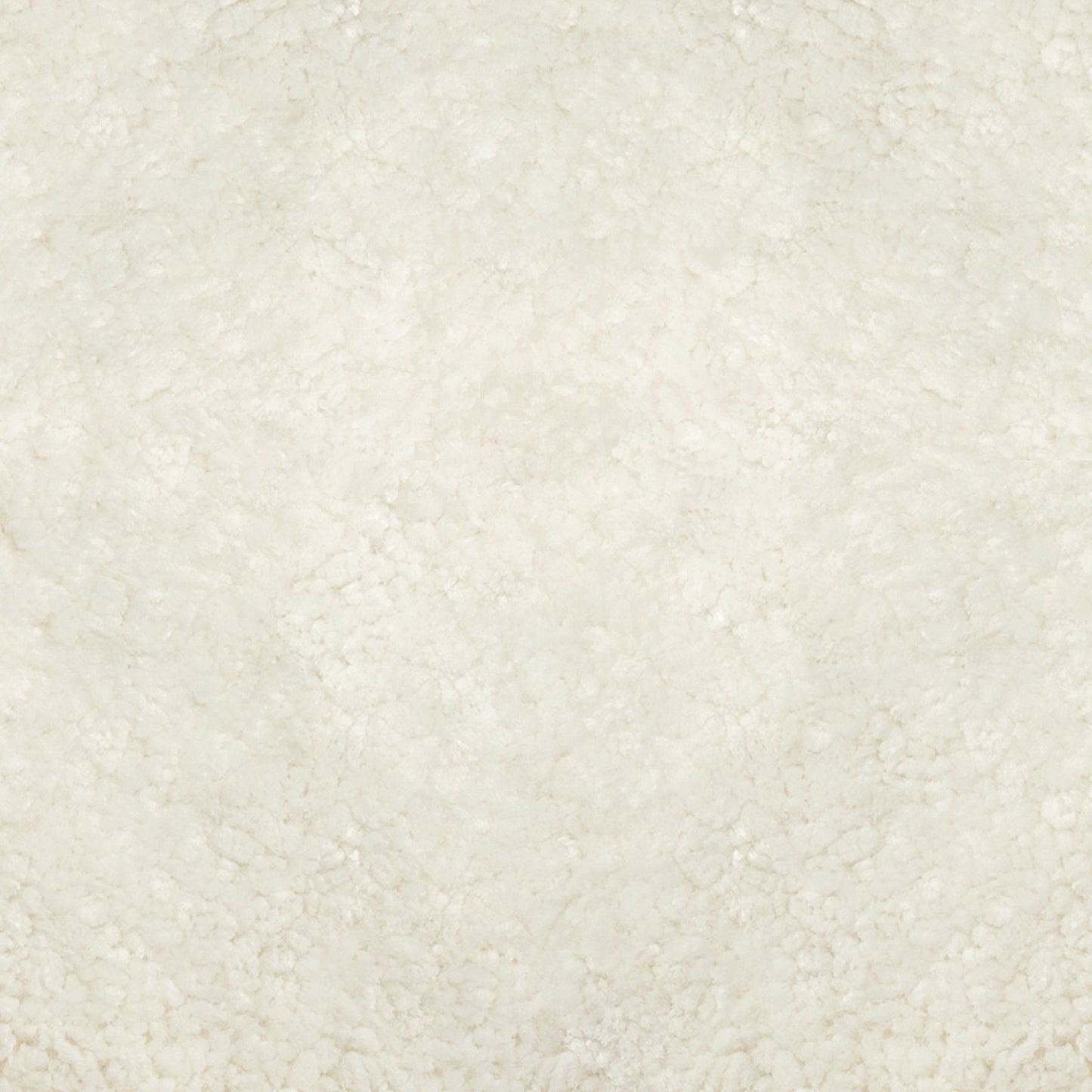 A close-up of off-white Skandilock sheepskin, showing the material's soft, dense, and curly texture.