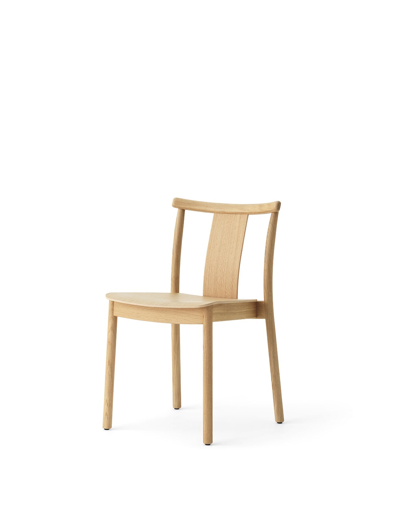 Merkur Dining Chair in natural oak, shown from a three-quarter angle. The chair has a curved backrest and four slender legs.
