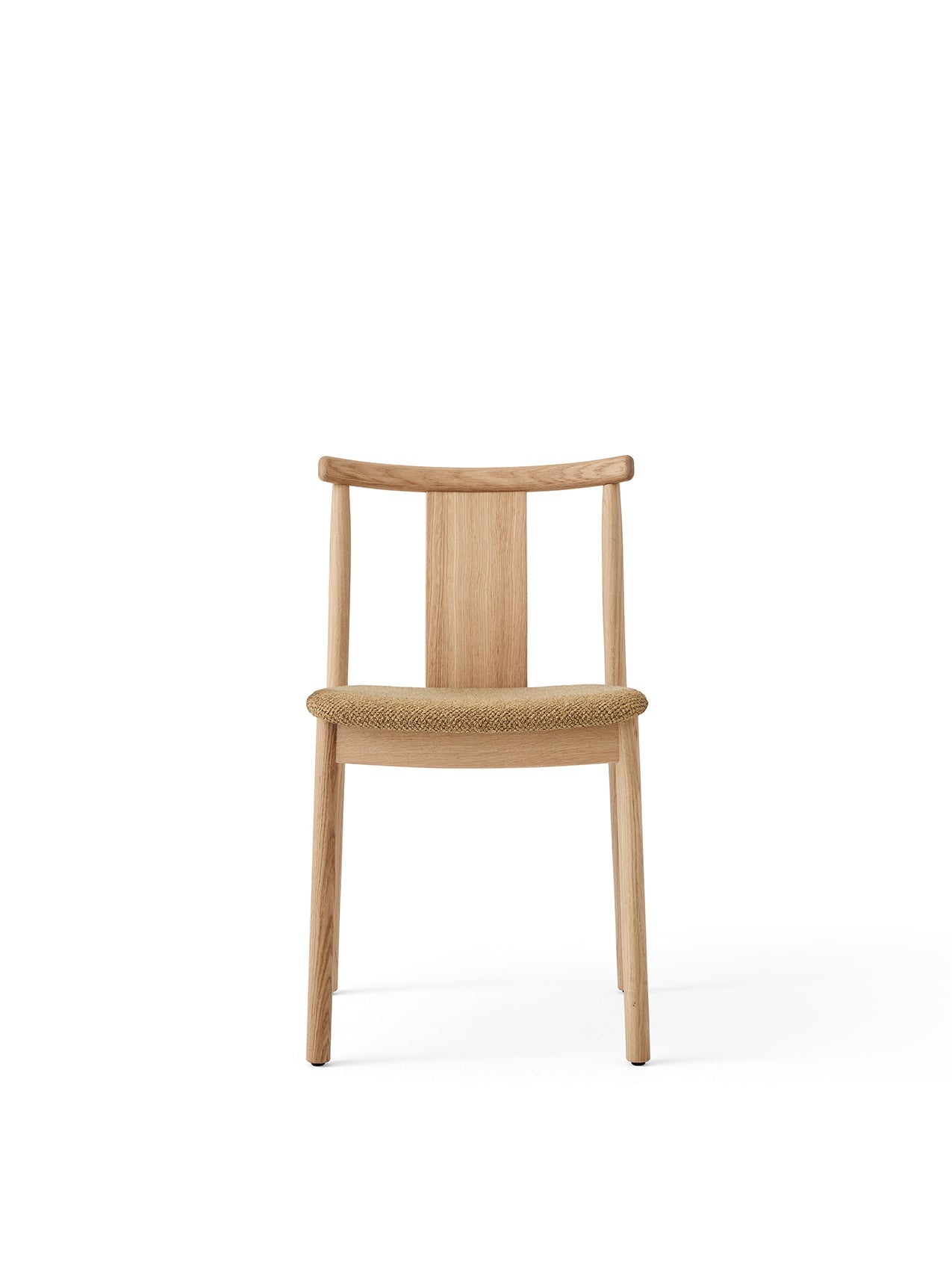 Front view of the Merkur Dining Chair. The chair has a natural oak frame with a curved back and a light brown bouclé seat.