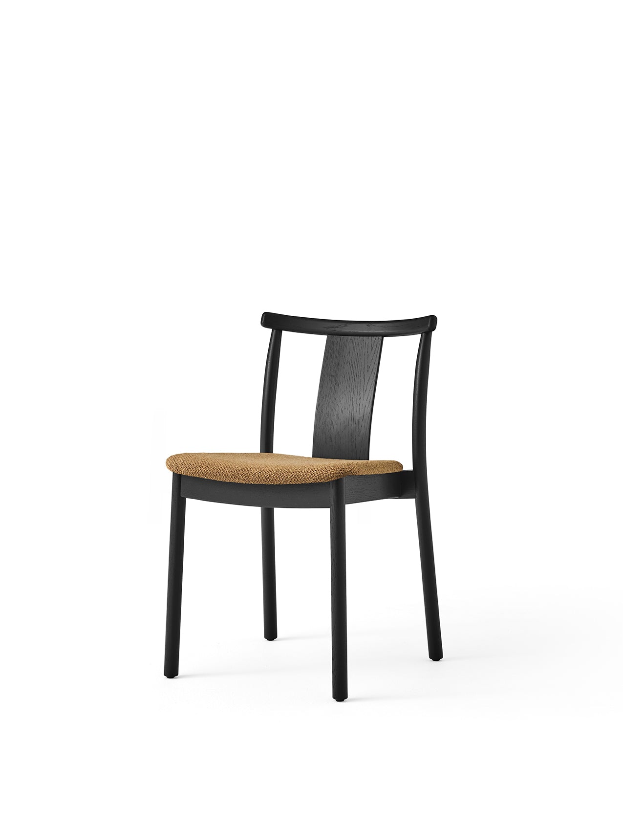 The Merkur Dining Chair, shown at an angle, features a black oak frame and a textured, tan Audo Bouclé 06 upholstered seat.
