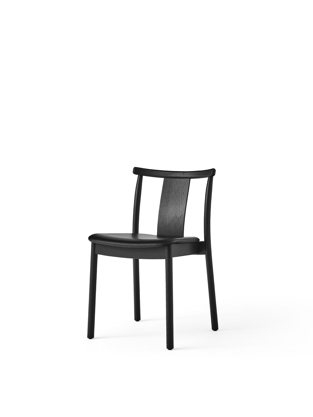 Merkur Dining Chair in black oak with a black leather upholstered seat, viewed from a slight angle.