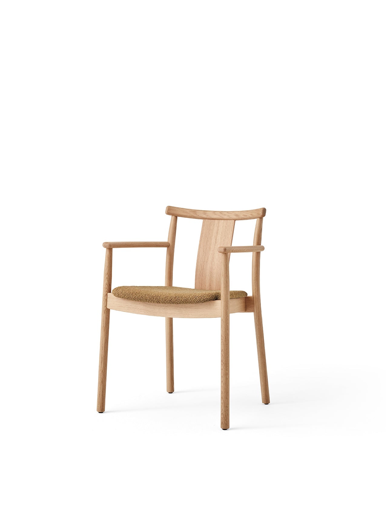 Angled view of the Merkur Dining Chair with Armrests. Natural oak frame with a seat upholstered in yellow bouclé fabric.