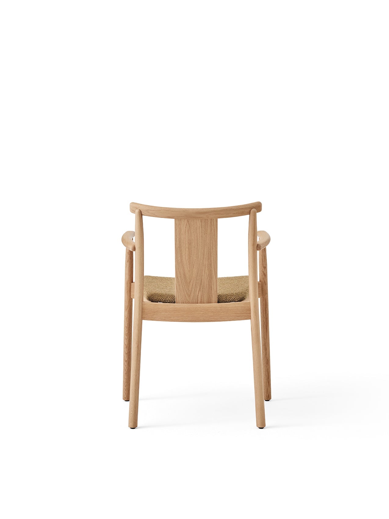 Back view of the Merkur Dining Chair with Armrests, showing its natural oak frame and Audo Bouclé 06 upholstered seat.