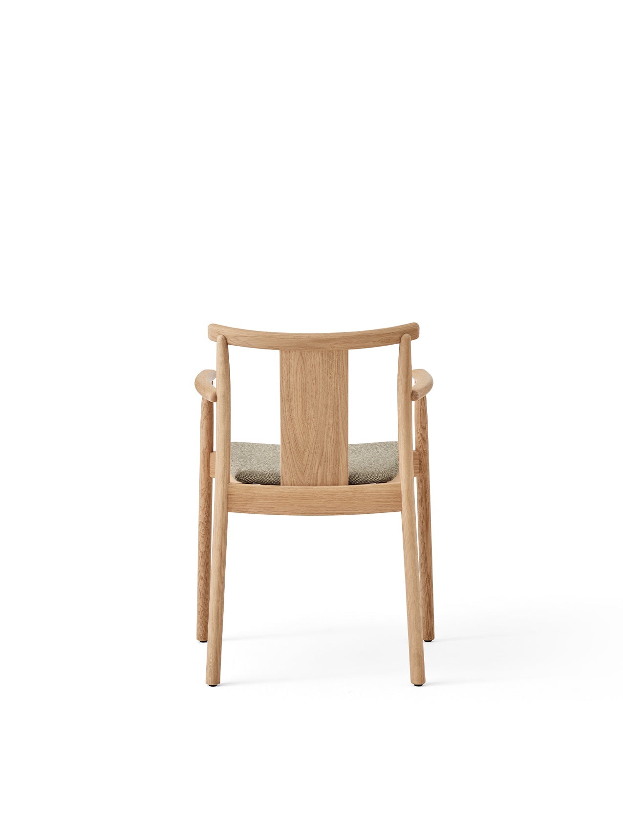 Back view of the Merkur Dining Chair with Armrests, featuring a natural oak frame and a light grey upholstered seat.