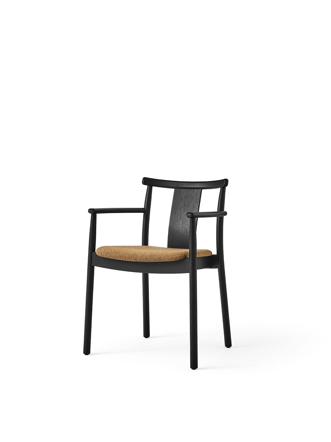 A Merkur Dining Chair with Armrests in black oak, shown from an angle. The chair has a textured, light brown bouclé seat.