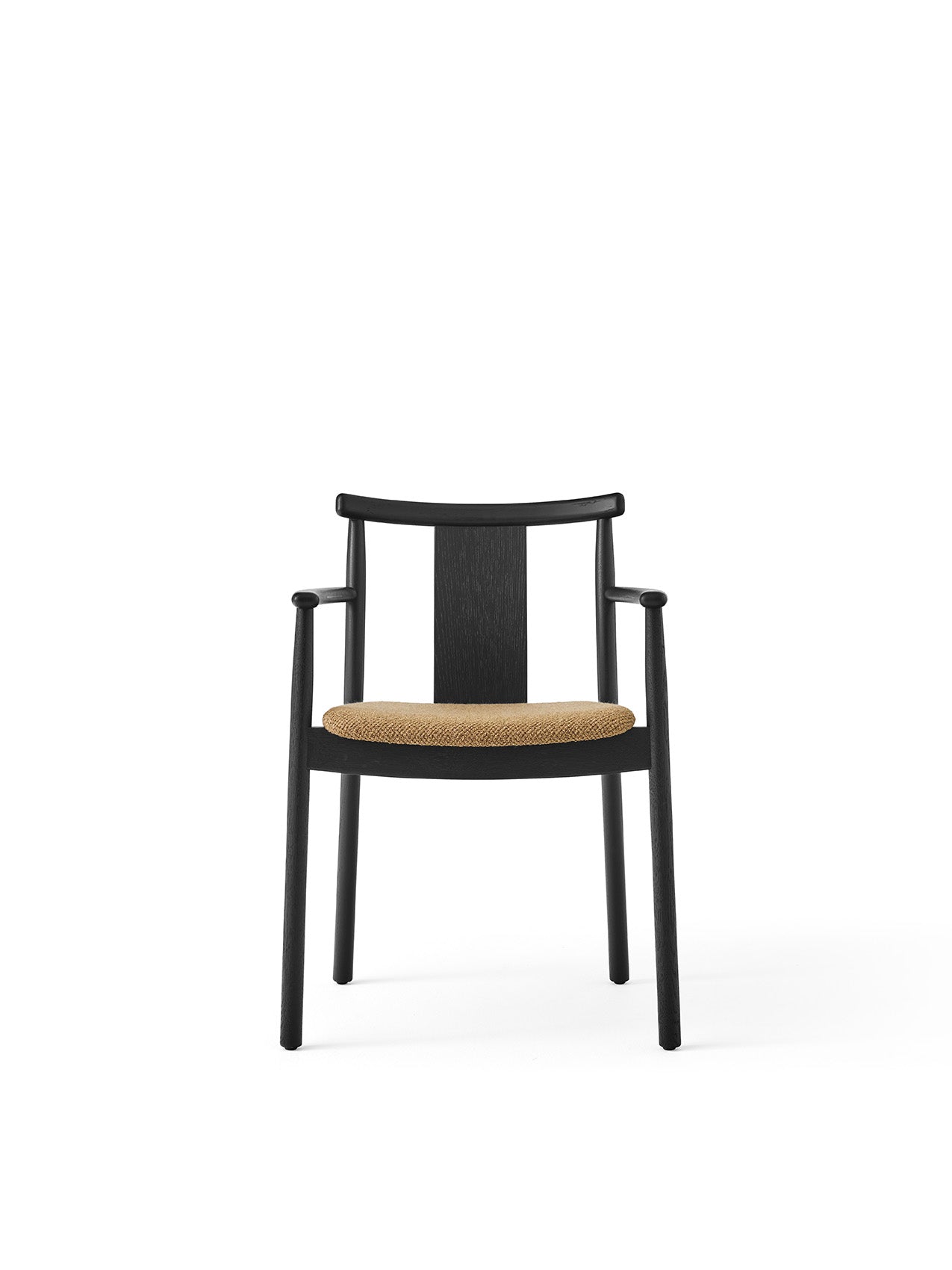 Front view of the Merkur Dining Chair with Armrests. It has a black oak frame and a textured beige Audo Bouclé seat cushion.