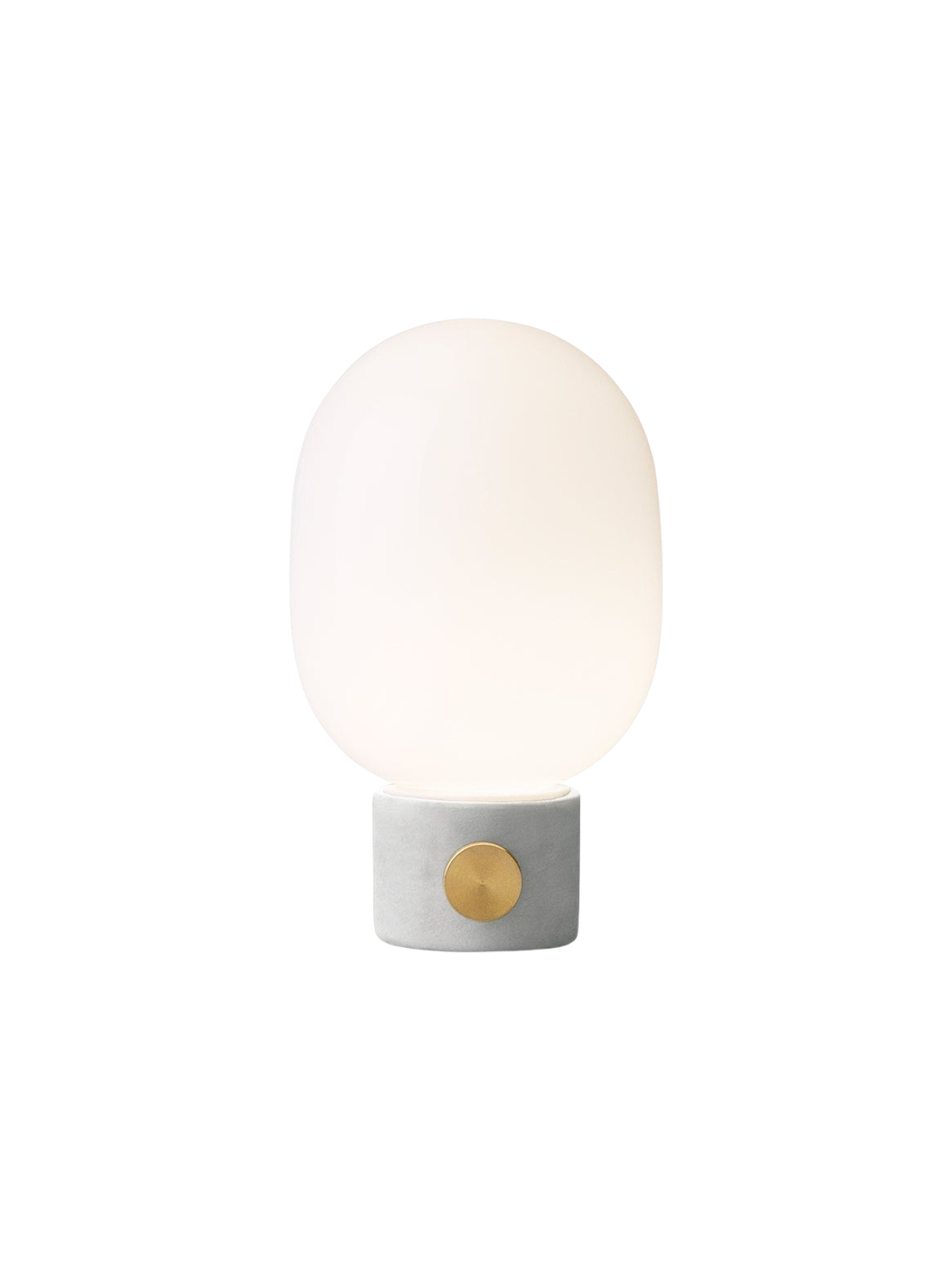 Front view of the JWDA Table Lamp, Small, with a light grey concrete base, brass dimmer knob, and lit opal glass shade.