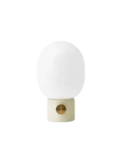 Front view of the JWDA Table Lamp, Small, with an Alabaster White steel base, brass dimmer and white opal glass shade.