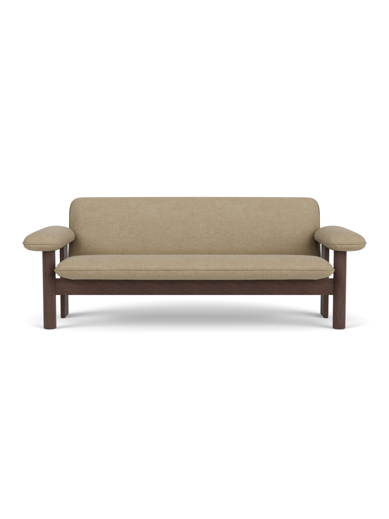 A front view of the Brasilia Sofa, featuring a dark stained oak frame with thick cushions upholstered in Audo Bouclé 02.