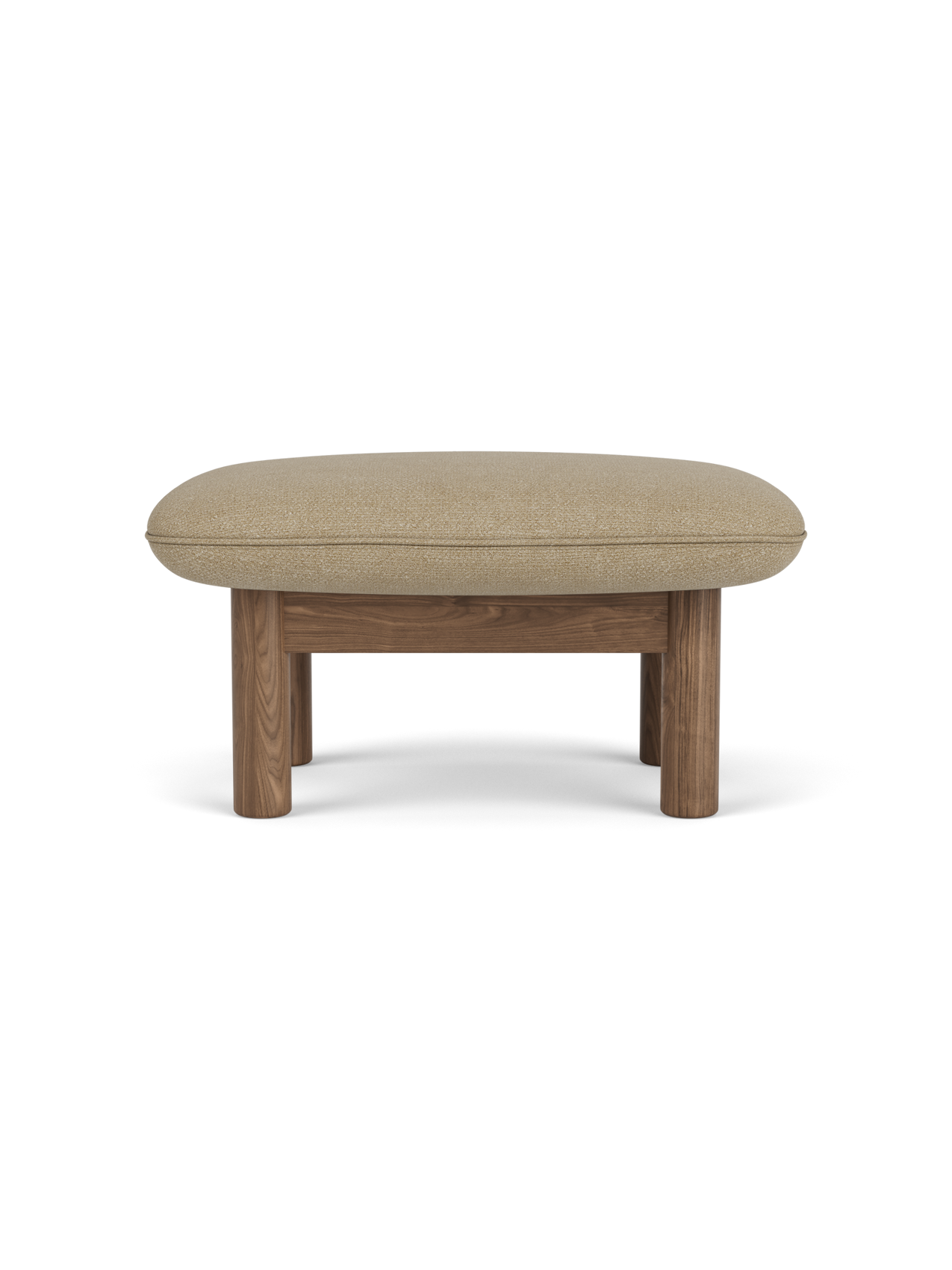 Side view of the Brasilia Ottoman with a walnut frame, thick cylindrical legs and a light beige Audo Bouclé 02 cushion.