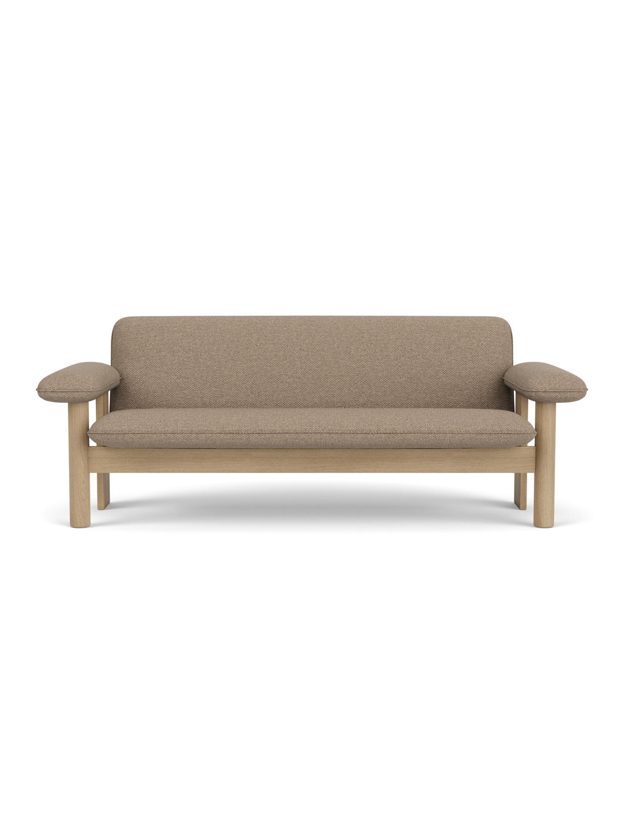 Front view of the Brasilia Sofa. The two-seater has a natural oak frame with rounded legs and exaggerated, padded armrests.