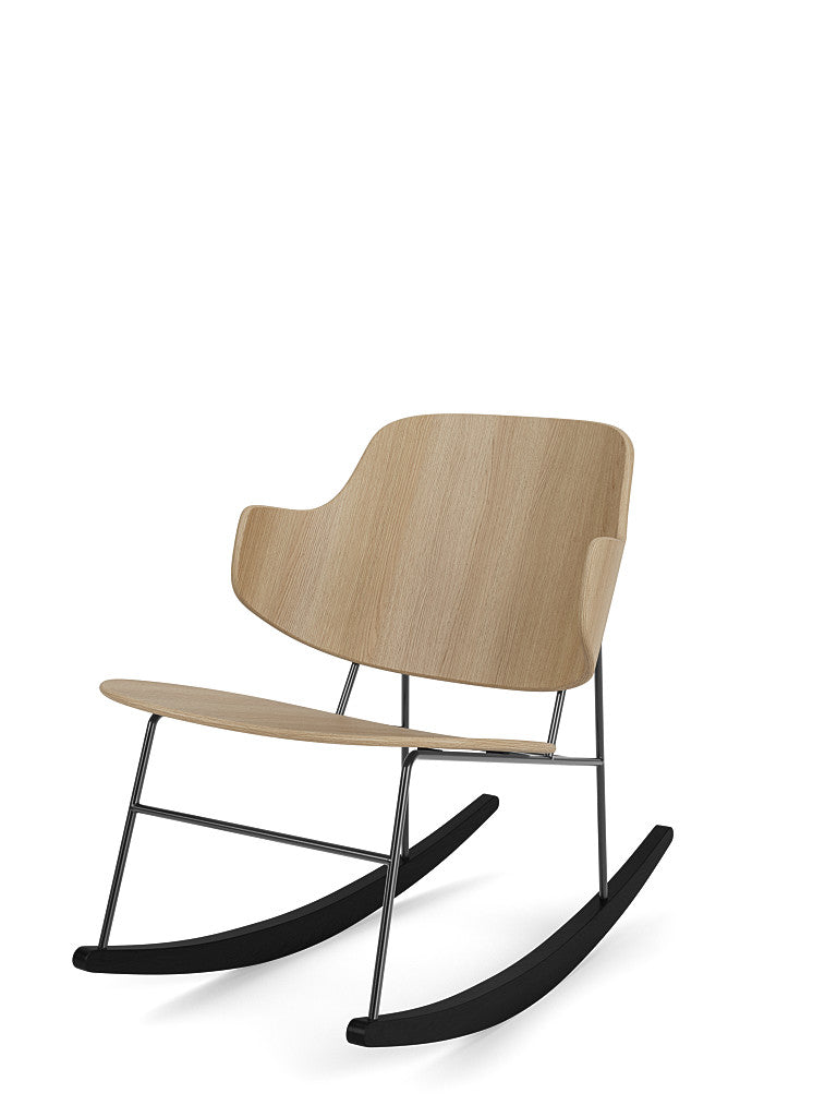 The Penguin Rocking Chair in natural oak with a black steel frame and black rockers, shown at a three-quarter angle.