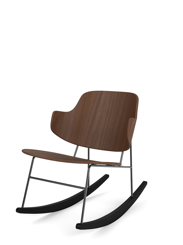 The Penguin Rocking Chair in walnut with a black metal frame and rockers, pictured at an angle against a white background.