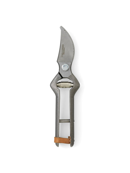 Overhead view of the Pallares Plant Pruner, closed, with textured grey metal handles and a brown leather strap.