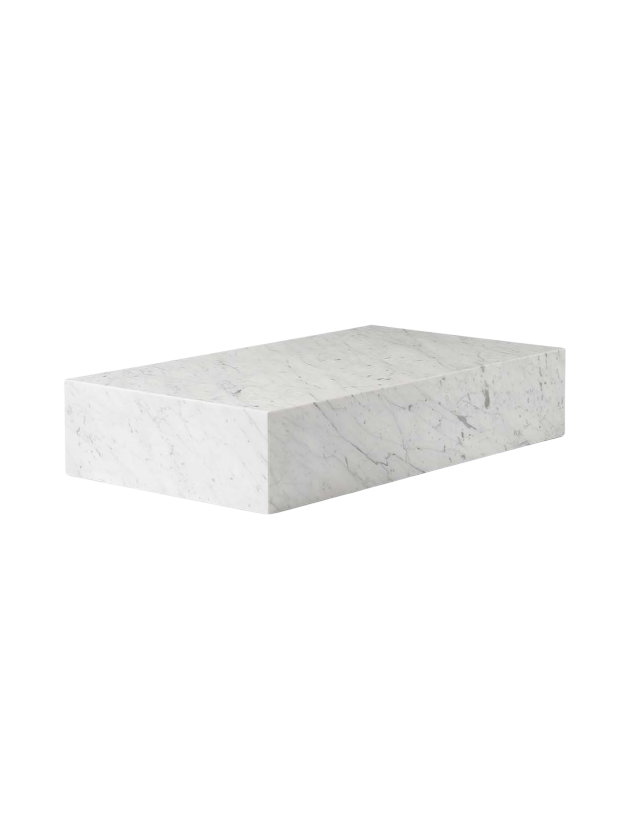Angled view of the Plinth Grand, a low rectangular table made of white Carrara marble with subtle grey veining.