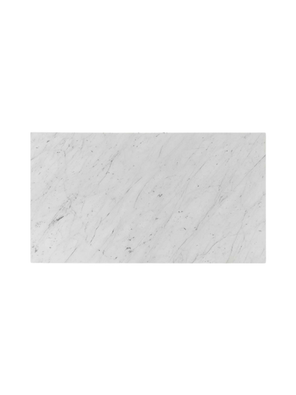 Top view of the rectangular Carrara marble top for the Plinth Grand, showing the natural grey veining on the white surface.