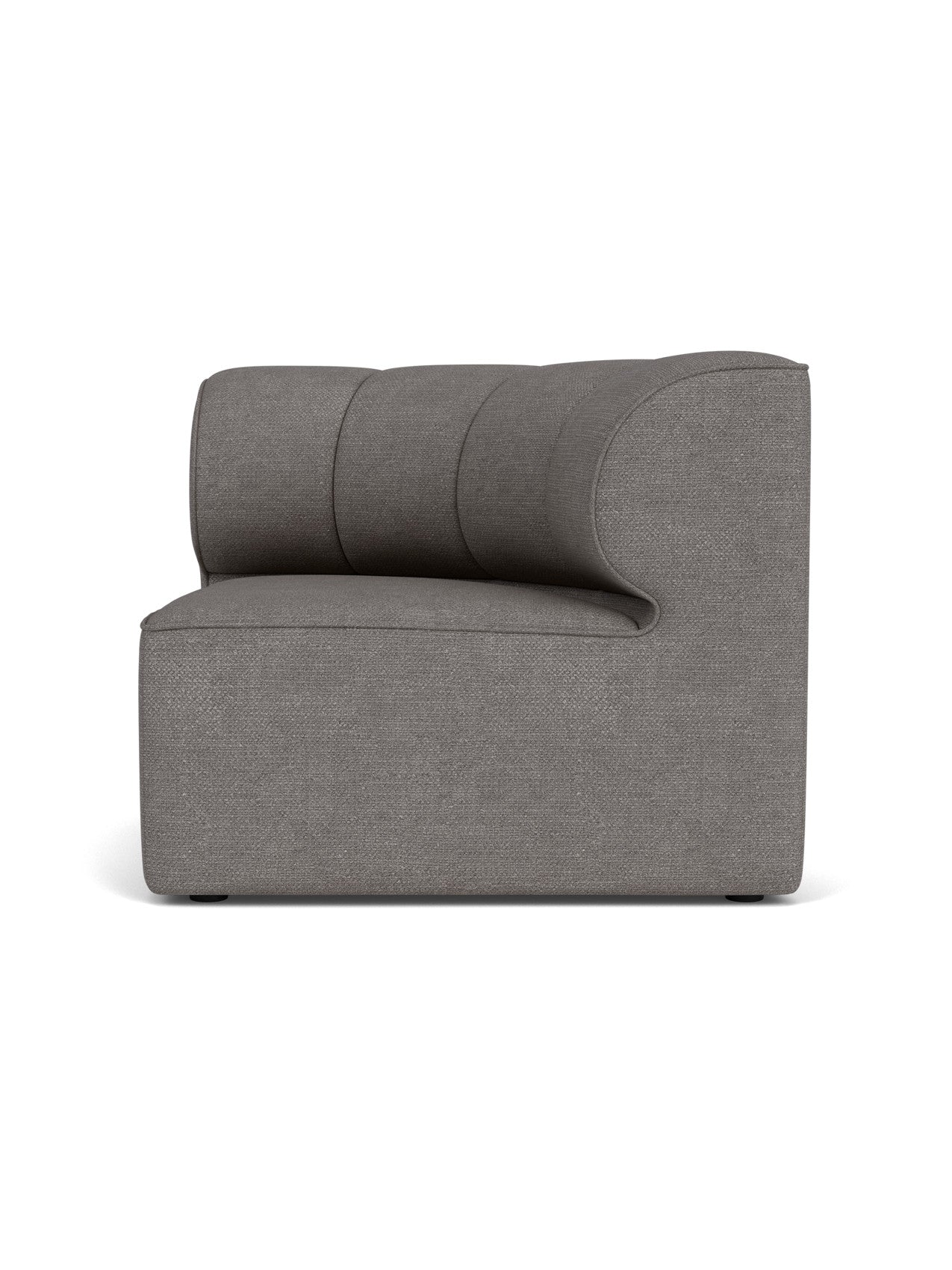 A side-on studio shot of the Eave Seamline Modular Sofa, 86, Concave, Corner, in a textured grey Audo Bouclé 16 fabric.