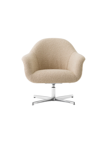 Front view of the Harbour Lounge Chair upholstered in light beige Baena 15 fabric with a polished aluminium swivel star base.