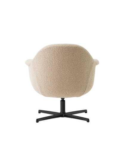 Back view of the Harbour Lounge Chair with light beige textured upholstery and a black, star-shaped swivel base.