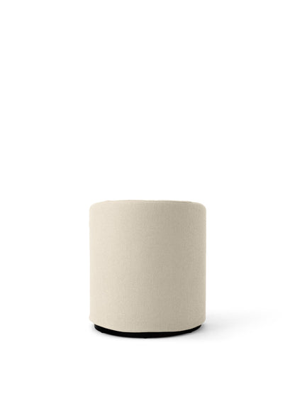 The cylindrical Tearoom Pouf upholstered in light beige Logan Jasmin fabric, shown from the front against a white background.
