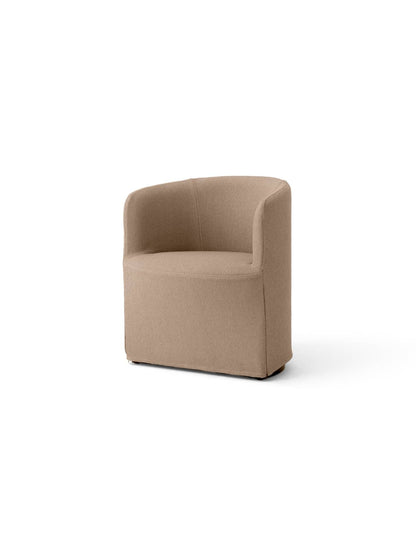 Angled view of the Tearoom Club Chair upholstered in a textured, light brown Logan Flint fabric, shown on a white background.
