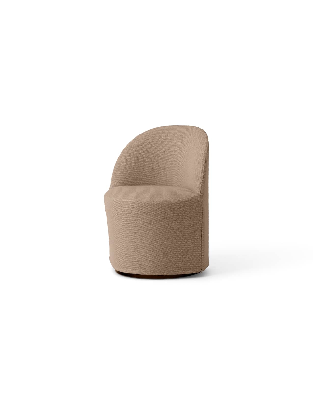 Angled view of the Tearoom Club Chair with Swivel and loose cover, upholstered in textured, light brown Logan Flint fabric.
