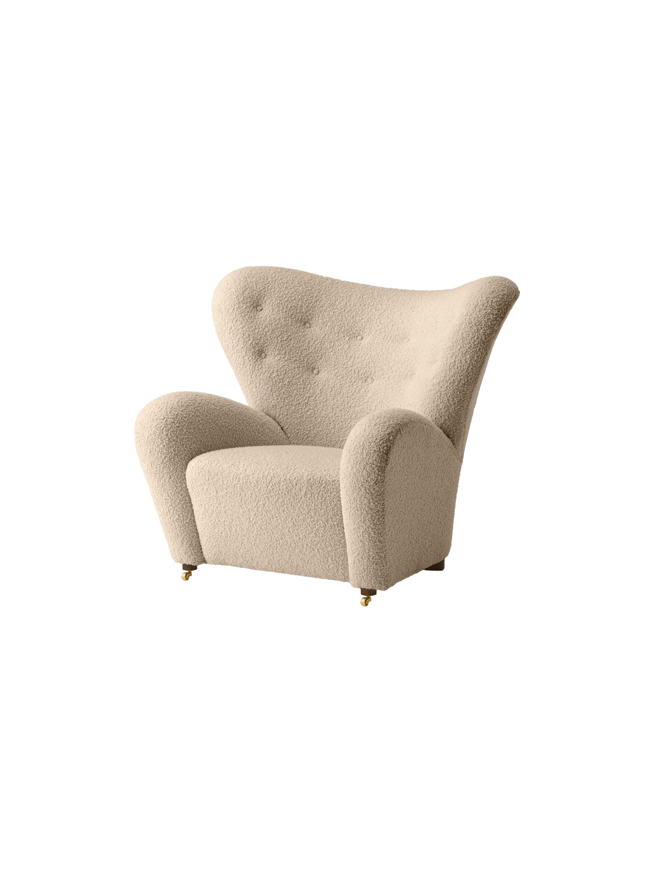 Angled view of The Tired Man Lounge Chair in plush, cream-coloured textile with a high, tufted back & brass front castors.