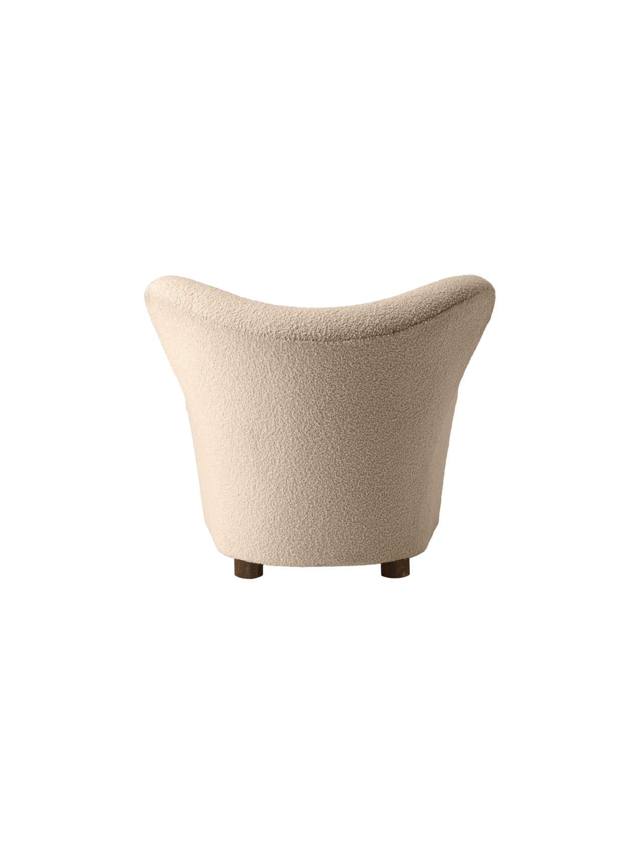 Back view of The Tired Man Lounge Chair in a textured, off-white fabric, showing its curved shape and dark wooden legs.