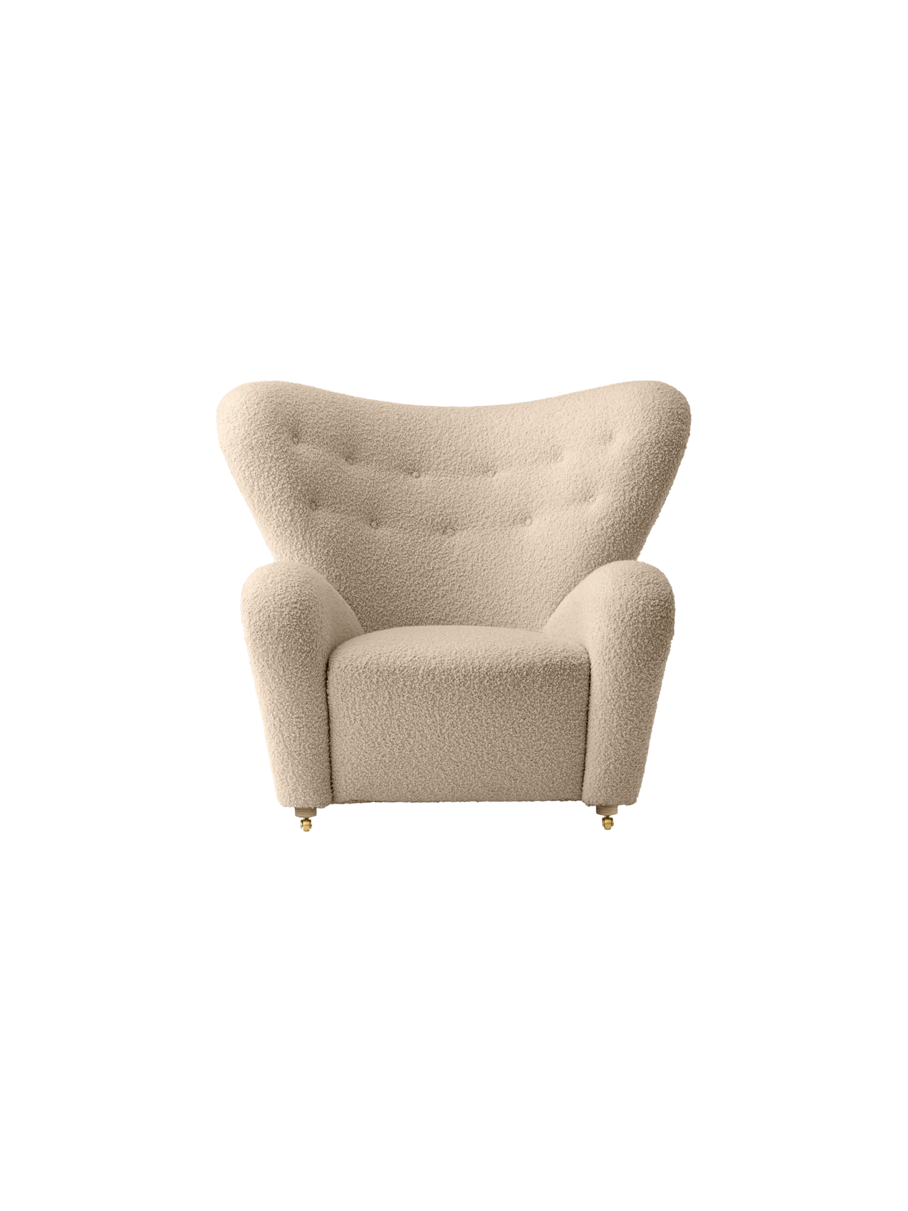 The Tired Man Lounge Chair, upholstered in a light, textured fabric with a tufted winged back and brass castors.