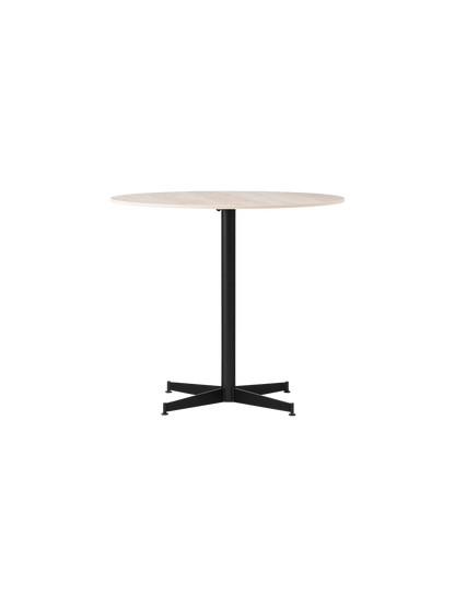Front view of the Nook Dining Table with a round, light-coloured stone top and a black powder-coated steel four-star base.
