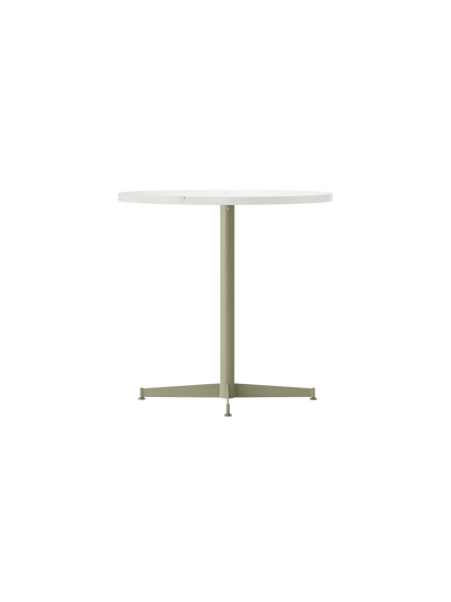 Front view of the Nook Dining Table with a round, light-coloured top and slender, olive four-star pedestal base.