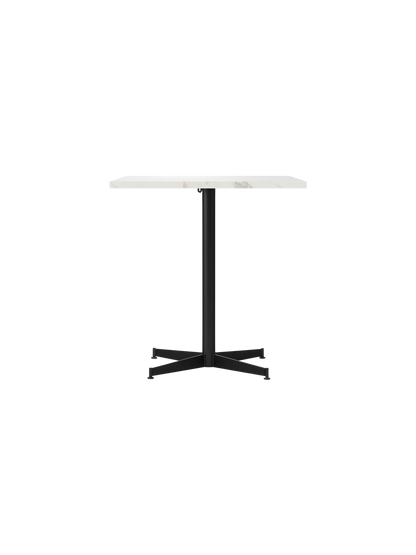A front view of the Nook Dining Table featuring a rectangular white marble tabletop and a slim, black four-star metal base.