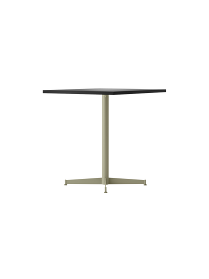Side view of the Nook Dining Table, featuring a square dark grey top and a pale olive green single-stem, four-star base.