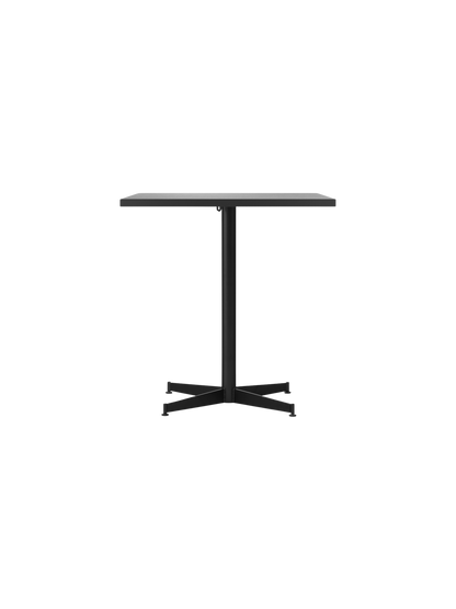 Front view of the Nook Dining Table with a rectangular stone tabletop and a slim, black powder-coated steel four-star base.