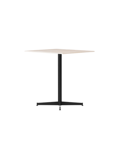 Angled view of the Nook Dining Table with a square, light-coloured top and black powder-coated steel four-star base.