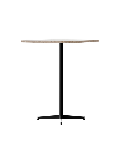 An angle view of the Nook Bar Table, featuring a round, textured stone top and a slender black steel pedestal base.