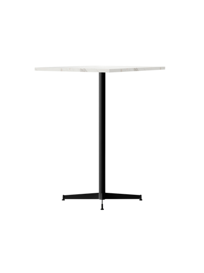 An angle view of the Nook Bar Table, featuring a round white marble top and a slim black powder-coated steel pedestal base.