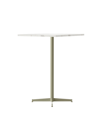 Angled view of the Nook Bar Table, featuring a round, white marble tabletop and a slender, ivory-coloured pedestal base.