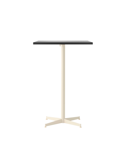 Front view of the Nook Bar Table, featuring a rectangular dark tabletop and a single pedestal ivory base with four legs.
