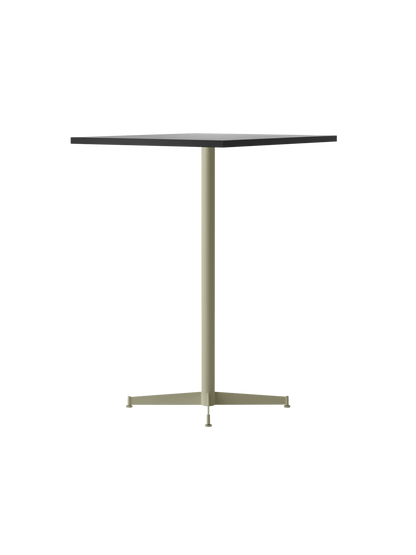 Angled view of the Nook Bar Table with a dark, rectangular tabletop and a slender, olive-coloured pedestal base on four feet.