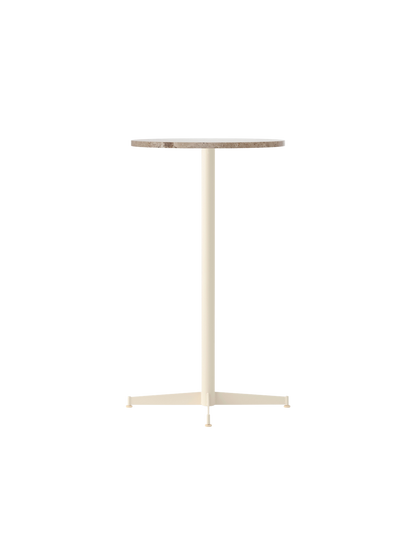 The Nook Bar Table with a round Kunis Breccia stone top and a four-legged pedestal base in ivory powder-coated steel.