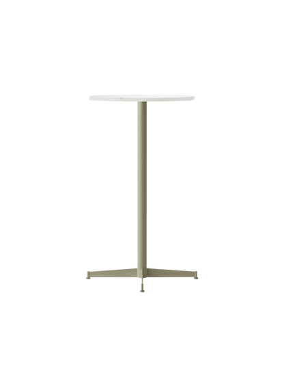 The Nook Bar Table with a round Estremoz marble top and an olive green base, shown from an angle against a black background.